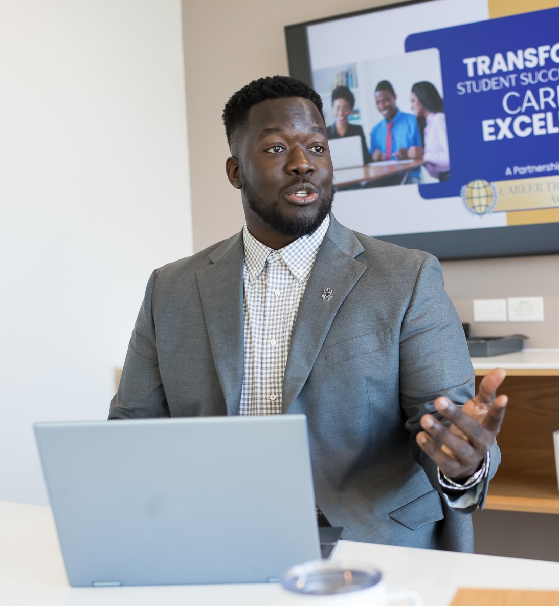Mark Thompson presenting in a conference room